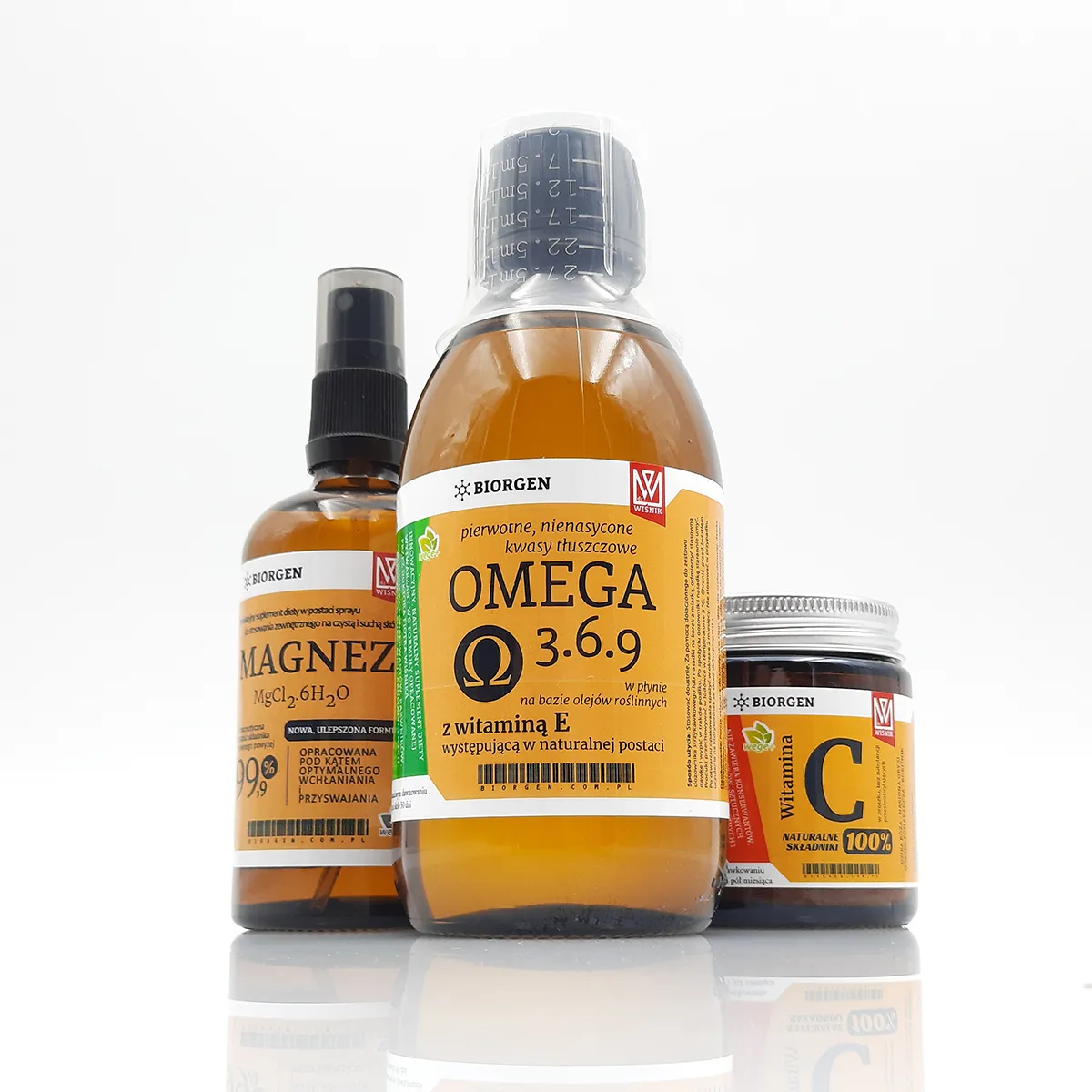 Trzy butelki suplementów diety Biorgen: Magnez, Omega i Witamina C.